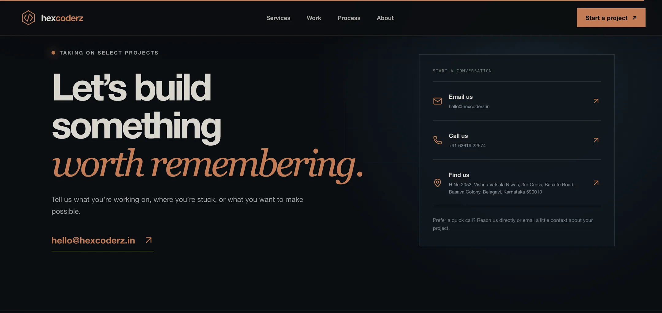 Hexcoderz let’s build something: “Worth remembering” in copper italic, with email, phone and address in one tidy panel.